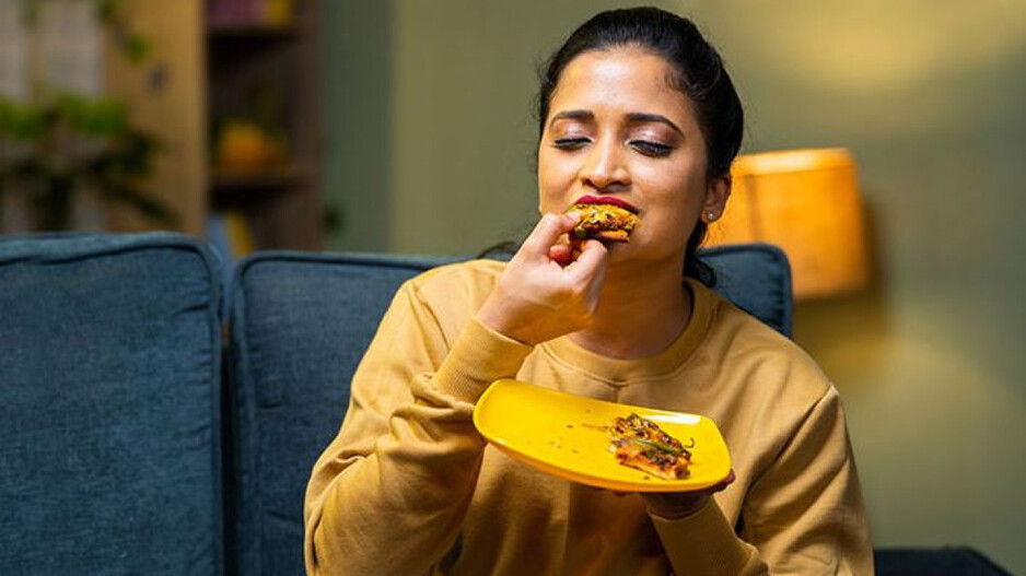 Woman Eating file Photo