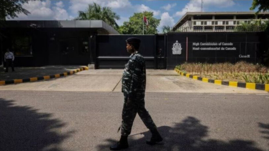 Canadian High-Commision in New Delhi A security personnel patrols outside the Canadian High-Commisio