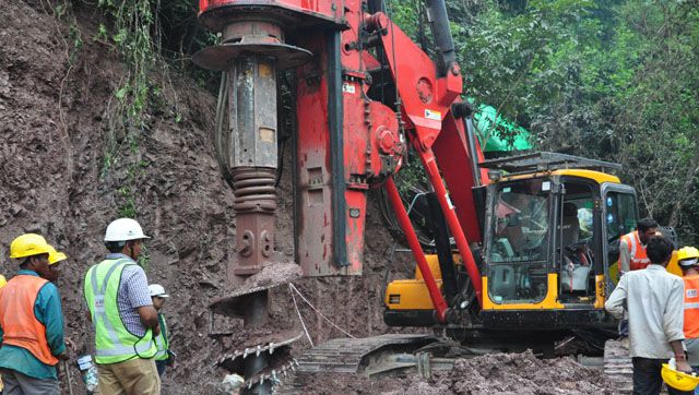 Two men trapped in a tunnel for nine days, rescuers battle odds