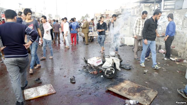 sadr-city-baghdad-market-bombings-kill-twenty-four