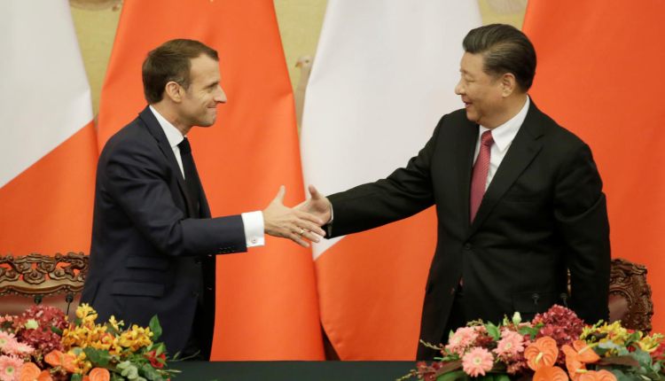 xi macron united on paris climate agreement