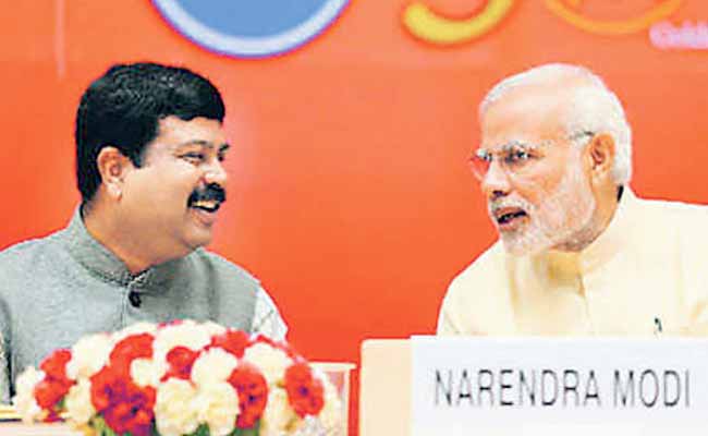 Dharmendra Pradhan and Narendra Modi