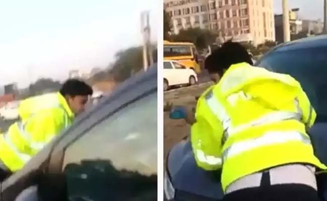 traffic-cop-dragged